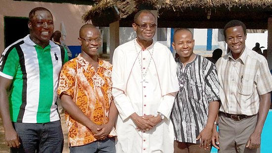 Bishop Alfred Agyenta of the Diocese of Navrongo-Bolgatanga in Ghana poses with Deacons Kevin Abakisi, left, Robert Abotzabire, Peter Akudugu and Albert Wugaa as the four men prepare for ordination to the priesthood.