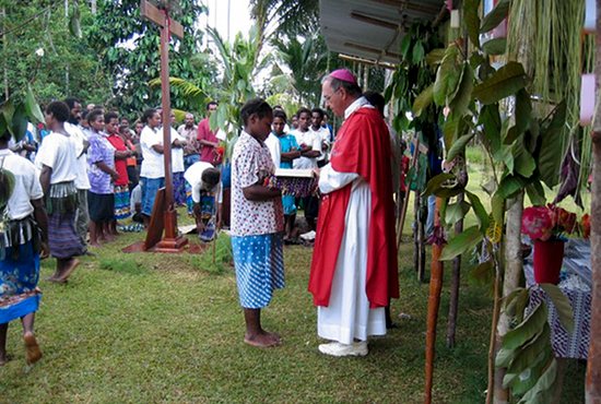 Bishop Giles Cote of Daru- Kiunga, Papua New Guinea celebrates an outdoor Mass. Photo courtesy of the Diocese of Daru-Kiunga