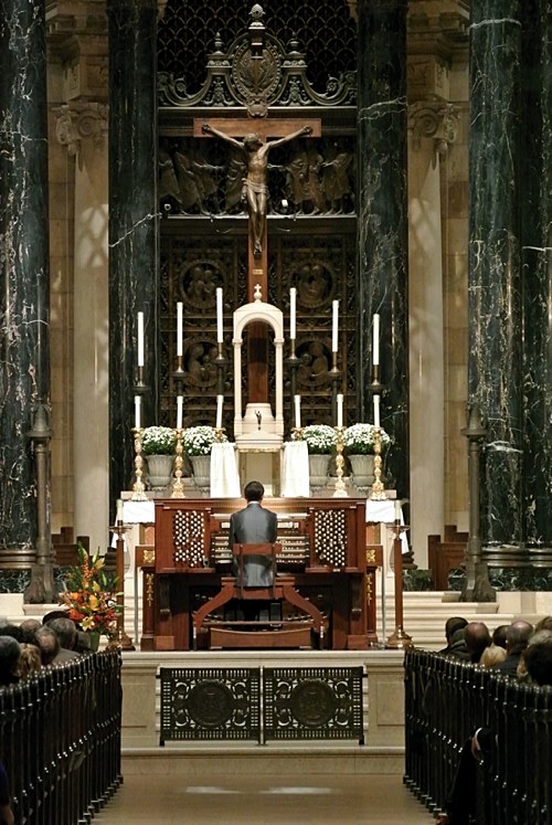 The organ console from the sanctuary was moved in front of the altar for the one-hour concert. Dianne Towalski/The Catholic Spirit