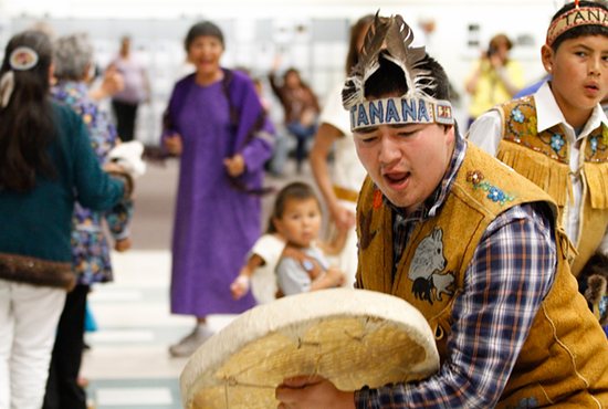 Raymond Hyslop of the Tanana Traditional Dance Group performs at a reception marking the 50th anniversary of the Diocese of Fairbanks, Alaska, Aug. 12 in Fairbanks. CNS photo