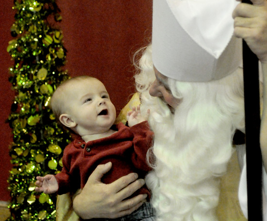 Six-month-old Luke Ernest posed for a picture with St. Nicholas. 