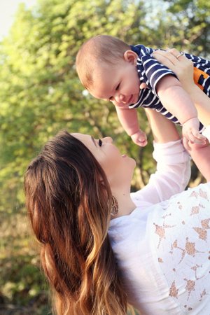 Rebekah Chaveste, who had successful RU-486 reversal after taking the pill at a Planned Parenthood clinic in San Francisco, plays with her son, Zechariah, in early March. CNS photo/courtesy Rebekah Chaveste