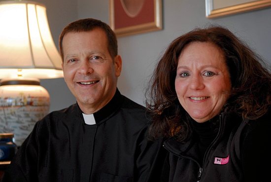 Father Michael G. Whyte, pastor of St. Catherine of Siena Parish in West Simsbury, Conn., sits beside parishioner Margaret Domashinski in the parish rectory 10 weeks after Sept. 9 surgery. Domashinski donated a kidney to her pastor to save his life. CNS photo/Jack Sheedy, The Catholic Transcript