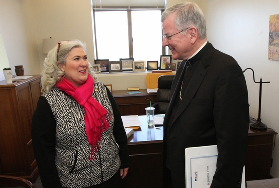 Archbishop John Nienstedt talks with state Representative Kelly Fenton, R, in her office at the State Office Building March 5. All of the bishops in Minnesota came for the day at the Capitol annual event, coordinated by the Minnesota Catholic Conference. Dave Hrbacek/The Catholic Spirit