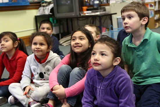 In this 2014 photo, preschool students at St. Bernard Catholic School in Cologne listen to a story. The pre-kindergarten-through-eighth-grade school will close at the end of the school year. Dave Hrbacek/The Catholic Spirit
