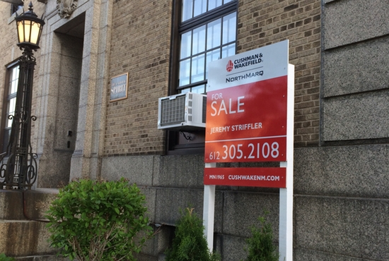For Sale sign posted on the building housing The Catholic Spirit offices on Dayton Avenue in St. Paul. Michael Pytleski/The Catholic Spirit
