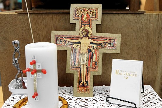 Displays with art and symbols are spread throughout the atrium for students to explore. Dave Hrbacek/The Catholic Spirit