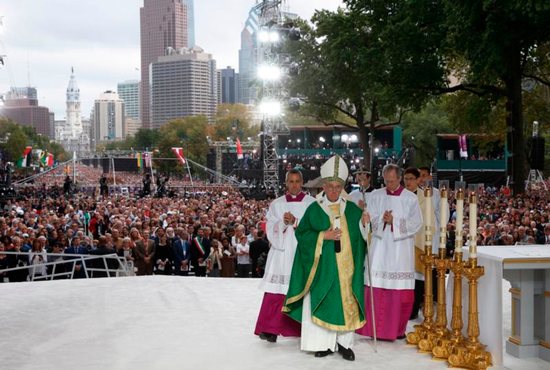 Pope Francis arrives to celebrate the closing Mass of the World Meeting of Families on Benjamin Franklin Parkway in Philadelphia Sept. 27. CNS photo/Paul Haring