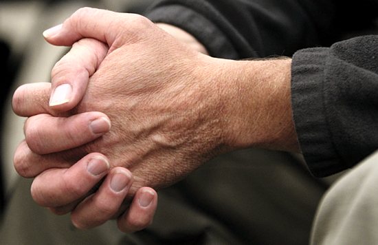 Prayer is a focus of the Tuesday morning gathering.