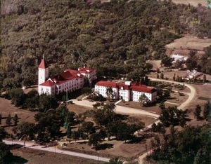This historic aerial view shows the classroom building of Villa Maria Academy, left, and Marian Hall. The classroom building burned down in 1969, and Marian Hall still stands today. Courtesy Villa Maria 