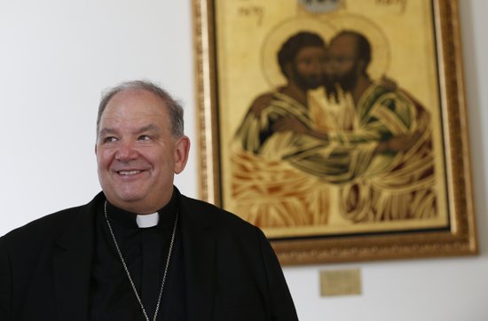 Archbishop Bernard A. Hebda of St. Paul and Minneapolis is pictured with an icon of Sts. Peter and Paul in the background at the Pontifical North American College in Rome June 29. Archbishop Hebda was among 25 new archbishops invited to the Vatican to attend Pope Francis' June 29 Mass with new archbishops from around the world. The Mass also marked the feast of Sts. Peter and Paul. CNS photo/Paul Haring