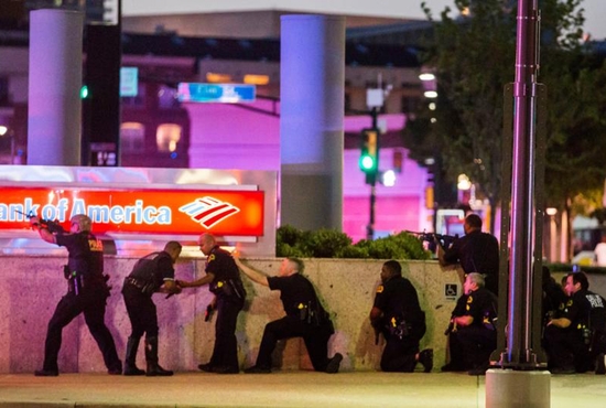 Police respond after shots were fired July 7 during a demonstration in Dallas to protest the police killing of black men in Baton Rouge, La., and a suburb of Minneapolis. Snipers shot and killed five police officers and wounded seven more at the Dallas demonstration. Two civilians also were injured. CNS photo/Smiley N. Pool, The Dallas Morning News handout via Reuters