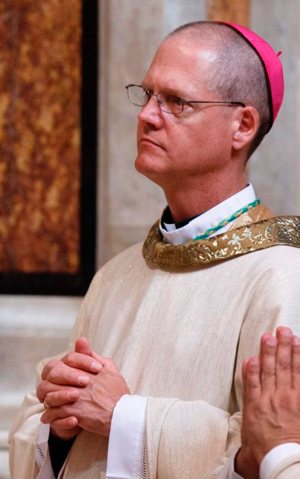 Bishop Paul Etienne of Cheyenne, Wyo., concelebrates Mass in 2012 at the Vatican. Pope Francis has accepted the resignation of Archbishop Roger Schwietz of Anchorage, Alaska, and appointed Bishop Etienne to be his successor. CNS photo/Paul Haring