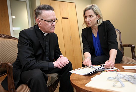 Susan Torborg talks about her R3 weight loss program with Father John Klockeman