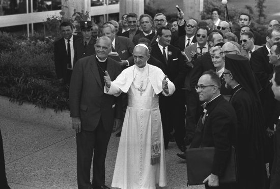 Pope Paul VI stands next to Eugene Blake, general secretary of the World Council of Churches, as he arrives at the headquarters of the WCC in Geneva June 10, 1969