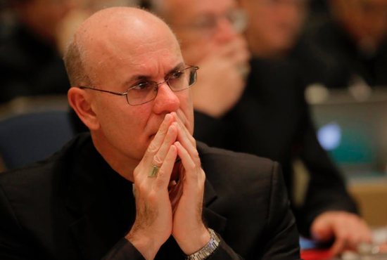 Bishop Kevin Rhoades of Fort Wayne-South Bend, Ind., listens to speakers Nov. 16 during the opening of the 2015 fall general assembly of the U.S. Conference of Catholic Bishops in Baltimore.