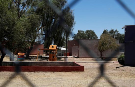 A playground at an immigration detention facility is seen in Phoenix, Ariz