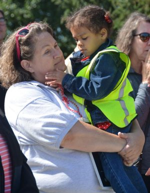 Linda Kile holds Larelle Thompson during a 40 Days for Life rally Sept. 26 at the Planned Parenthood facility in Indianapolis. Kile helped save Larelle from being aborted at the same facility three-and-a-half years ago.