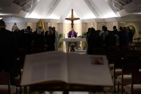 Pope Francis celebrates Mass Dec. 20 in the chapel of the Domus Sanctae Marthae. The day’s Gospel reading was of the Angel Gabriel announcing to Mary that she would bear God's son, a reading Pope Francis said was tough to preach about, because when God became human "everything changes, history turns upside down." 