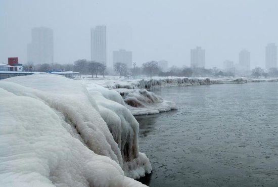 The banks of Lake Michigan are seen frozen with the Chicago skyline in the background Jan. 29, 2019, as bitter cold sweeps across much of the central and eastern United States. Hundreds of schools and several large universities closed their campuses Jan. 29 as temperatures plummeted across the Midwest, with forecasters warning that the frigid weather would get worse and could be life-threatening.