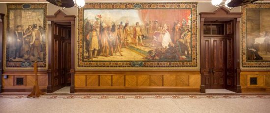 Murals by Luigi Gregori that adorn the ceremonial entrance to the University of Notre Dame's main building, depicting the life and exploration of Christopher Columbus, are seen Oct. 10, 2015, on the campus in Indiana. Holy Cross Father John I. Jenkins, president of the university, has determined the historic murals depicting Columbus' arrival in the New World will be covered, saying he feels today those images marginalize certain groups.