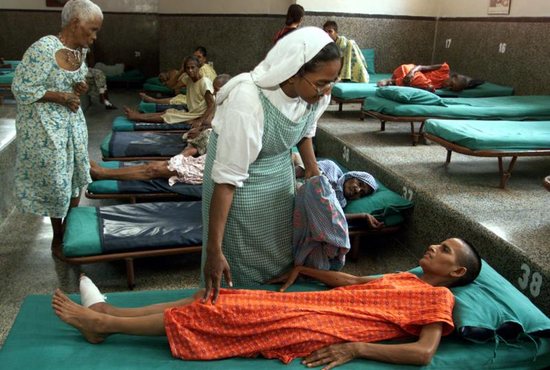 A member of the Missionaries of Charity cares for a critically ill patient at Nrimal Hriday home for the dying opened in 1952 by St. Teresa of Kolkata in India. In his message for the World Day of the Sick, celebrated Feb. 11, Pope Francis said that life is "a gift from God" that is "best suited to challenging today's individualism and social fragmentation."
