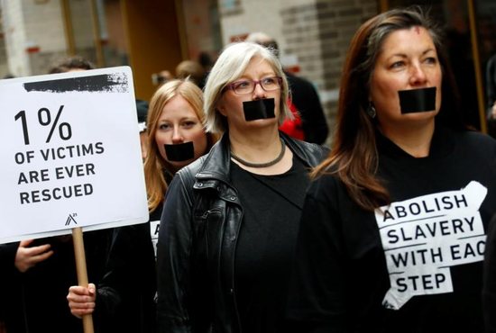 Activists take part in a "Walk for Freedom" in 2018 to protest against human trafficking in Berlin. The Frederick Douglass Trafficking Victims Prevention and Protection Reauthorization Act of 2018 recently passed by Congress and signed Jan. 8 by President Donald Trump allocates $430 million through 2022 to prevent and respond to human trafficking in the U.S. and abroad.