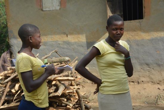 Young women chat Nov. 11, 2018, in Mbale, Uganda. The Holy Cross Sisters in eastern Uganda have launched a campaign to end violence against women and girls.