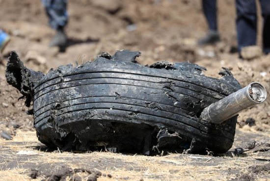 A tire of the Ethiopian Airlines Flight ET 302 is seen March 11, 2019, near Bishoftu, Ethiopia. The crash killed 157 people from 35 countries. Among the dead were Georgetown University law student Cedric Asiavugwa and four Catholic Relief Services staffers: Getnet Alemayehu, Mulusew Alemu, Sintayehu Aymeku and Sara Chalachew.