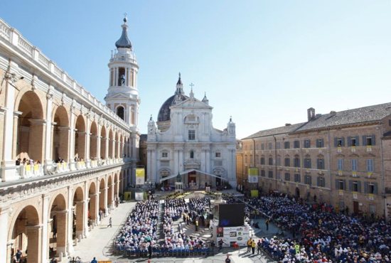 Pope Benedict XVI celebrates Mass outside the Sanctuary of the Holy House in Loreto, Italy, Oct. 4, 2012. The small house inside the basilica is traditionally venerated as the house of Mary, miraculously transplanted from the Holy Land.