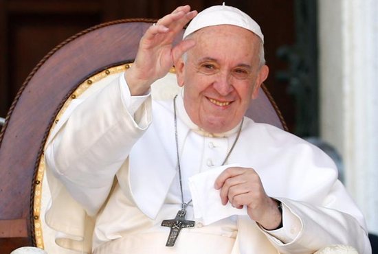 Pope Francis waves as he speaks to pilgrims during a visit to the Sanctuary of the Holy House on the feast of the Annunciation in Loreto, Italy, March 25, 2019.