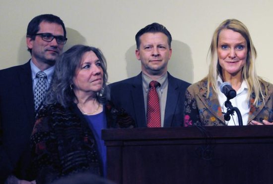 Moana Patterson, at left, a teacher at Valley View Elementary in Bountiful, Utah, appears at a March 11, 2019, news conference, where she told reporters she never would have asked her student, William McLeod, to wash off the ashes on his forehead if she had known they were a sacred religious symbol. She is pictured with two members of the Utah Legislature, Republican Rep. Ray Ward and Republican Sen. Todd Weiler, and Tiffany Ivins-Spence, the mother of a student in Patterson's class.