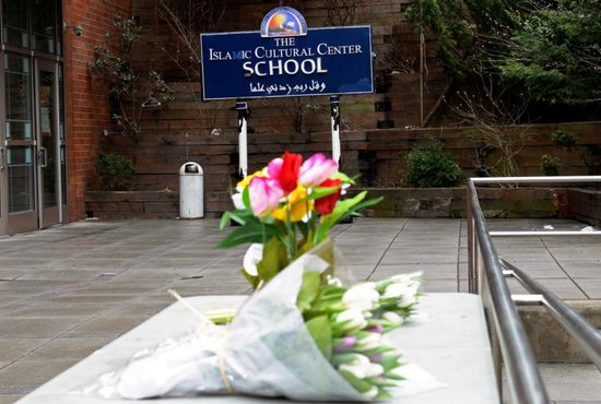 People leave flowers at the Islamic Cultural Center of New York in New York City March 15, 2019, after the Christchurch mosque attack in New Zealand. Forty-nine people were assassinated and at least 40 more are being treated for gunshot wounds following the terror attacks.