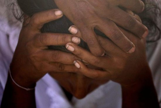 A mother in Negombo, Sri Lanka, mourns her daughter, who died in Easter bomb blasts, during a wake April 22, 2019. Sri Lankan officials reported 290 confirmed deaths from the eight blasts at churches and hotels in three cities the previous day. 