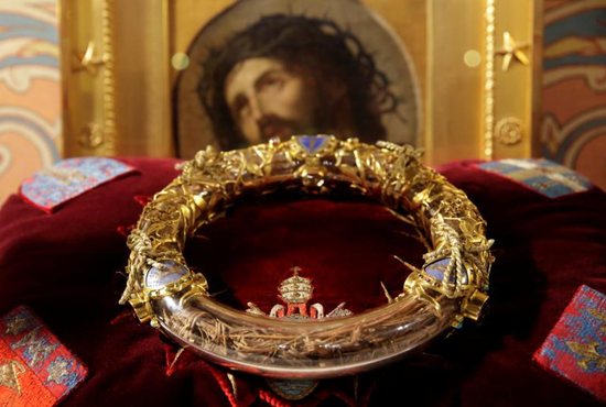 A reliquary containing what tradition holds is Jesus' crown of thorns is displayed during a ceremony at Notre Dame Cathedral in Paris March 21, 2014. A major blaze engulfed the iconic cathedral April 15, 2019, sending pillars of flame and billowing smoke over the center of the French capital.