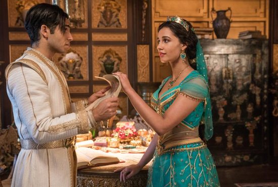 Mena Massoud and Naomi Scott star in a scene from the movie "Aladdin." The Catholic News Service classification is A-II -- adults and adolescents. The Motion Picture Association of America rating is PG -- parental guidance suggested. Some material may not be suitable for children.