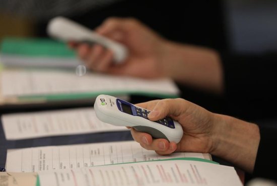 Bishops use electronic voting devices during the spring general assembly of the U.S. Conference of Catholic Bishops in Baltimore June 12, 2019.