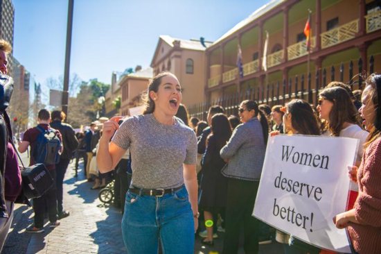 Bethany Marsh, a 23 year-old university student, leads pro-file supporters outside the New South Wales Parliament House in Sydney