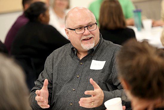 Jim Rice of Mary, Mother of the Church in Burnsville makes a point during small group discussion
