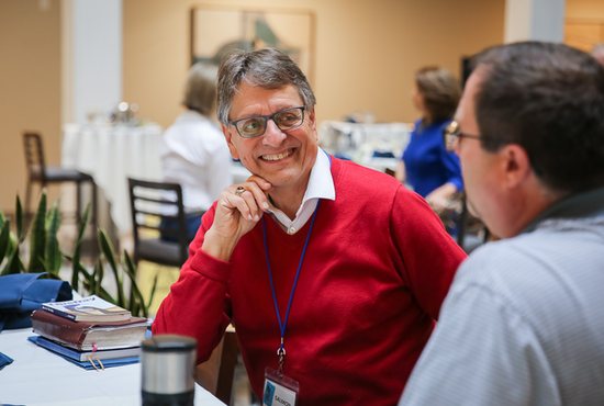 Will DeSanto, left, a member of the Minneapolis chapter of Christians in Commerce and of Annunciation in Minneapolis, chats with James Ganther from the Tampa, Fla., chapter at the organization’s 2019 annual conference in Bloomington.