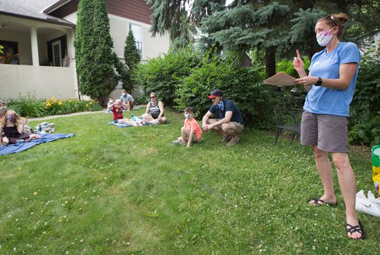 Theresa O’Toole, catechetical ministry coordinator, connects planting seeds to the Catholic faith in a lesson she delivered to children and parents at St. Cecilia in St. Paul June 28, 2020. 