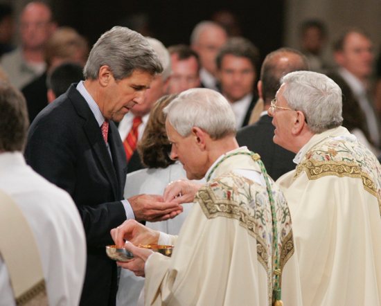 Democratic Sen. John F. Kerry of Massachusetts receives Communion from Archbishop Pietro Sambi, the apostolic nuncio to the United States, during Archbishop Donald W. Wuerl's installation as archbishop of Washington at the Basilica of the National Shrine of the Immaculate Conception in Washington in this June 22, 2006, file photo. In a May 7 letter, Cardinal Luis Ladaria, prefect of the Congregation for the Doctrine of the Faith, cautioned U.S. bishops about implementing a national policy on Communion for politicians who support "abortion, euthanasia or other moral evils." 