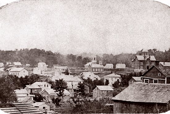 St. Joseph in Red Wing’s first church (left side, center), was a white, wood-framed structure dedicated in 1865. It seated 100 people and served as the parish home until a larger, stone church was built in 1877.