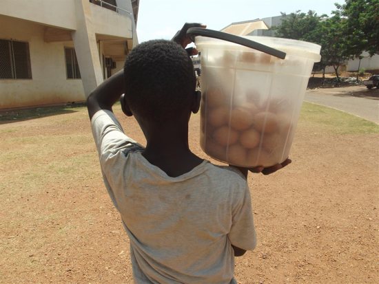 A boy sells eggs on the streets of Bangui, Central African Republic, in April 2021.