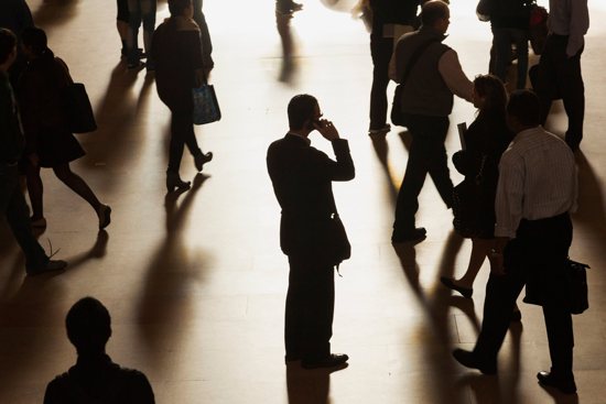 A man speaks on a cellphone in this illustration photo.