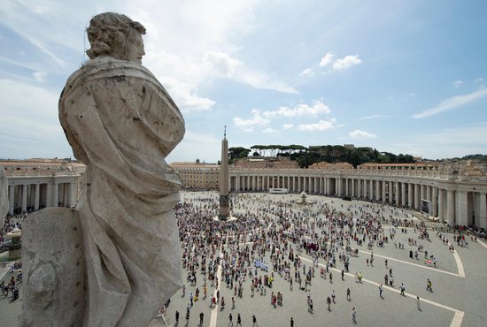 People gather in St. Peter's Square at the Vatican July 4, 2021, for the Angelus prayer with Pope Francis. After speaking about the day's Gospel reading and leading the prayer, Pope Francis went to Rome's Gemelli hospital for colon surgery.