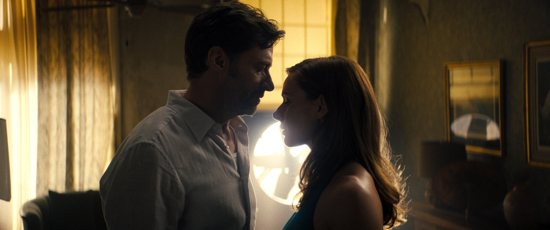 Hugh Jackman and Rebecca Ferguson star in a scene from the movie "Reminiscence."