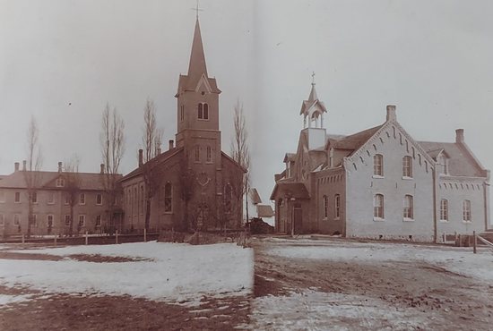 Pictures of St. Joseph church and school in Waconia as they existed at that time are merged in this 1880 photo.