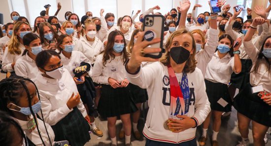 Katie Ledecky takes a selfie with students during her alma mater visit to Stone Ridge School of the Sacred Heart in Bethesda, Md., Sept. 17, 2021.