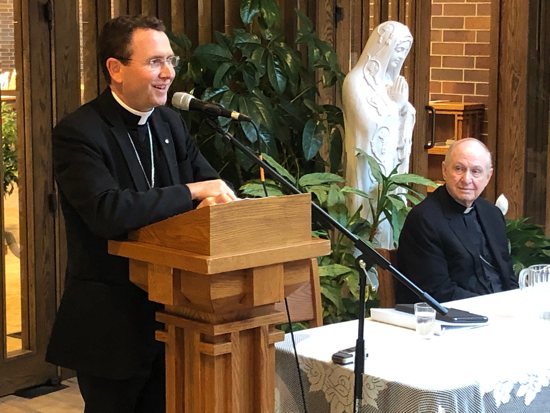 Bishop Andrew Cozzens speaks at an Oct. 18 news conference after his appointment as bishop of the Diocese of Crookston, at the Cathedral of the Immaculate Conception in Crookston. Bishop Richard Pates, apostolic administrator of the Crookston diocese, also spoke.